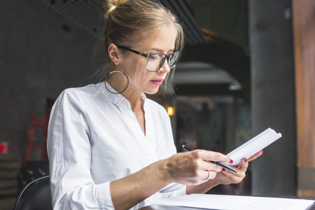 young woman working document restaurant 1024x683 1